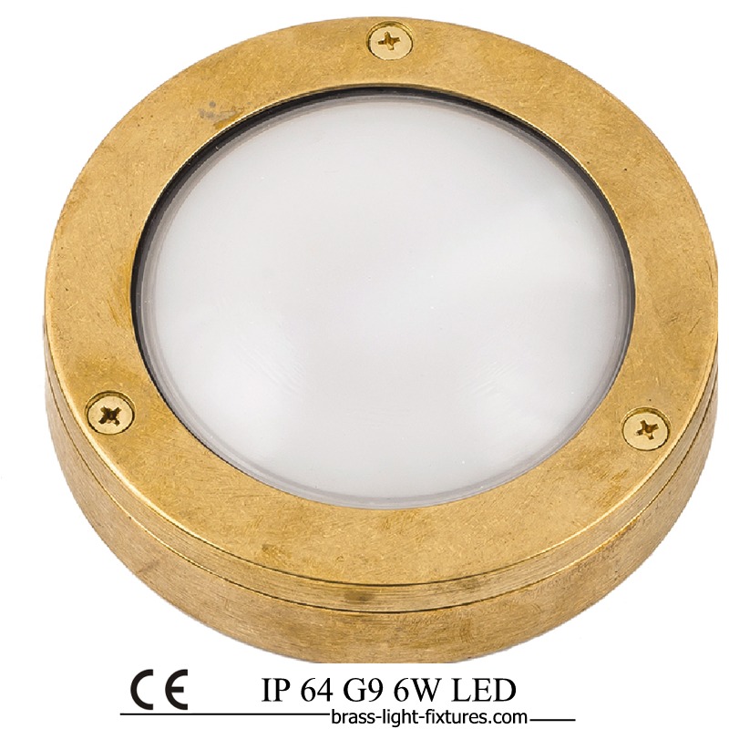 Round brass bulkhead with frosted glass. Made of Brass